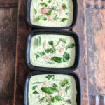 three herbed hummus garnished with herbs and Australian finger lime