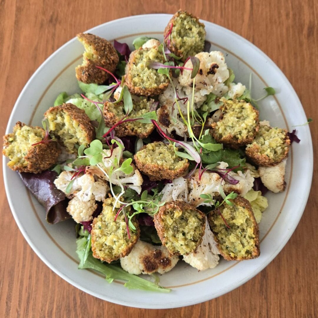 Photo of a falafel salad, photo links to the Personal Chef Meal Delivery webpage.